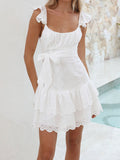 Ruffle tie front dress in white