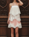 Ivory blush lace tiered criss-cross back mini dress - front view editorial